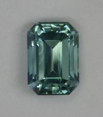 Nice blue with touch of green emerald cut