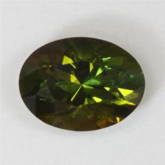Dichroic darker grass green and bownish yellow green oval