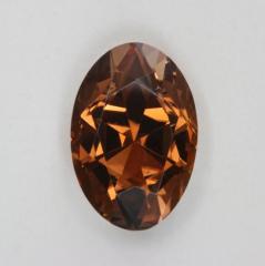 Beautiful stable deeply cut golden brown oval.