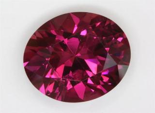 Moderately included ,middle of the road, darker pink oval.