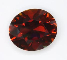 Dark toned, flash diven golden orange color, oval