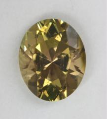 Paler brownish yellow oval that is dichrolc.