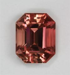This peach pink tourmaline is a beautiful gemstone, emerald cut