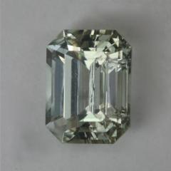 An extremely light green emerald cut for IceT time, with growth tubes.