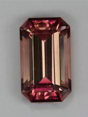 Dichroic pink tourmaline with growth tubes.