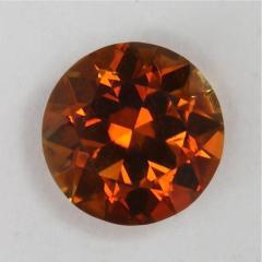Dichroic orange with touch of red droplet of color.