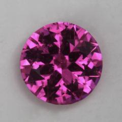 Rich Pink with flashes of Red droplet.