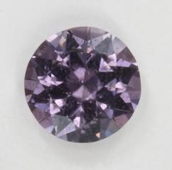 Grayed Purple droplet of color.