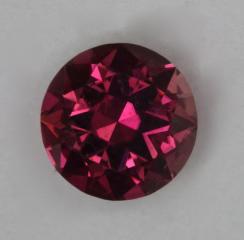 Darker brown orange red droplel of color