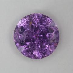 A fine included purple round