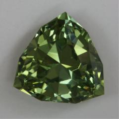 Fine yellow green clean shield cut.