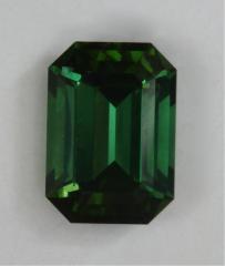 Modest stable green emerald cut with closed ends.