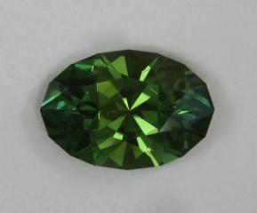 Average dichroic green oval