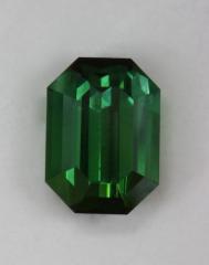 Average green emerald cut with steep ends.