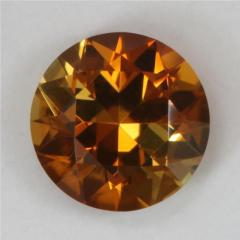 Dichroic droplet with golden orange and yellow slices of pie.