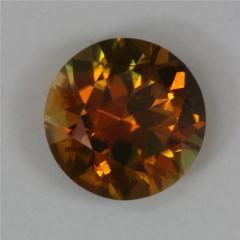 A fine darker golden yellow with a touch of brown, droplet of color.