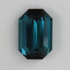 A very fine blue, steep ended emerald cut