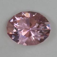 Bright, flashy, lightly toned pink oval