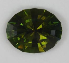 Bright flash, forest green, around a duller center, olive green, oval.