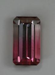 Beautiful eye clean, pink and cream bicolor emerald cut.