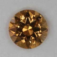 A very transparent golden droplet of color.