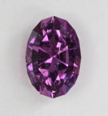 Nice medium purple oval that contains copper