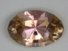 A  twisted beige oval