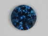 A moving sapphire blue droplet.