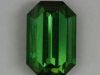 Nice tourmaline green, touch of yellow closed ended emerald cut.