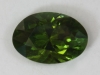 One of a matching pair of yellowish green ovals
