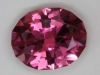 Bright, flashy, medium pink oval with flatter crown