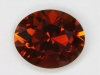 Desaturated orange color leads to mahogany, oval
