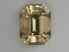 Included creamy yellow emerald cut.