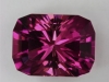 Medium Dark Toned Dichroic Pink Barion Cushion Cut.