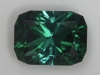 Slightly dichroic medium dark green Barion Cut Cushion.