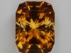 A great dichroic orange Barion Cushion with stepped crown.
