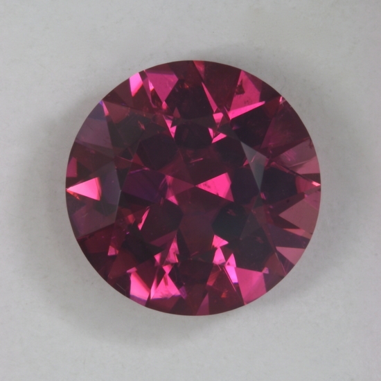 Fine, slightly include, average pink round.  #29