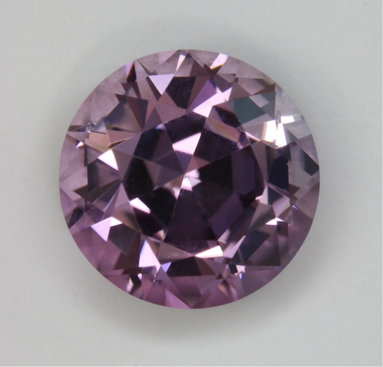 Eye clean, deep pavilion, lavender round.  #31