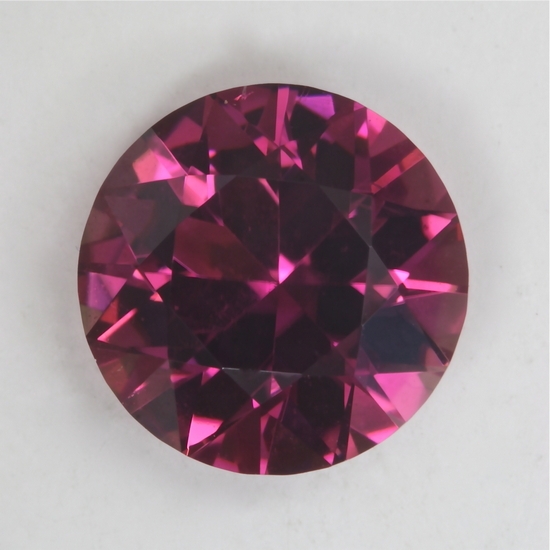 Nice medium toned,decent pink, that is eye clean, round.  #32