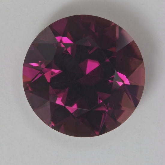 Darker tone level purplish pink round.  #34