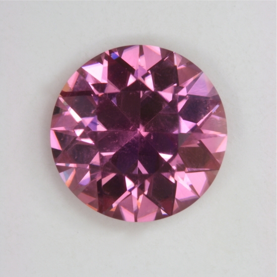 A nice eye clean middle of the road pink round.