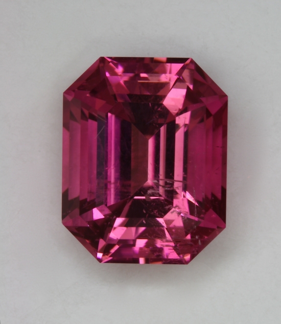 Clearly included, bright pink emerald cut #472