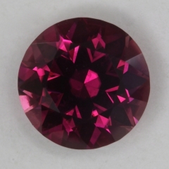 A darker rose colored droplet of color.  #607