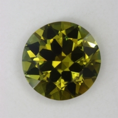Medium dark, peridot colored, round.  #642