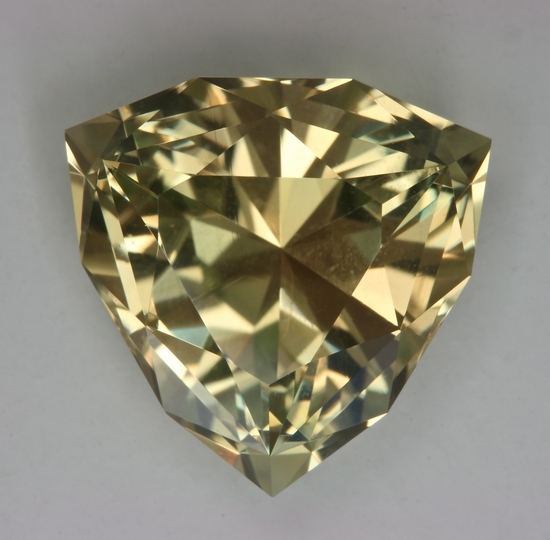 Large, pastel yellow shield cut.  #895