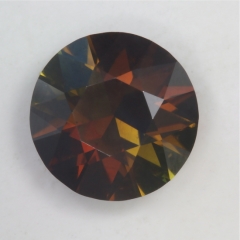 Chocolate brown with a bit of mint, dichroic round.  #88