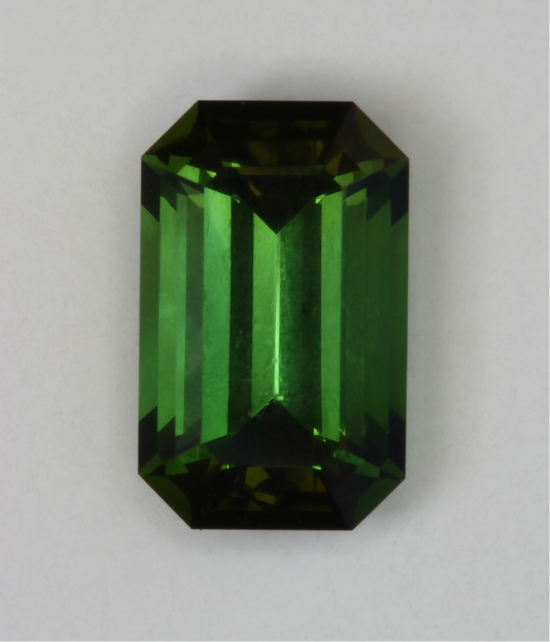Fine classic tourmaline green emerald cut with darker ends. #1017