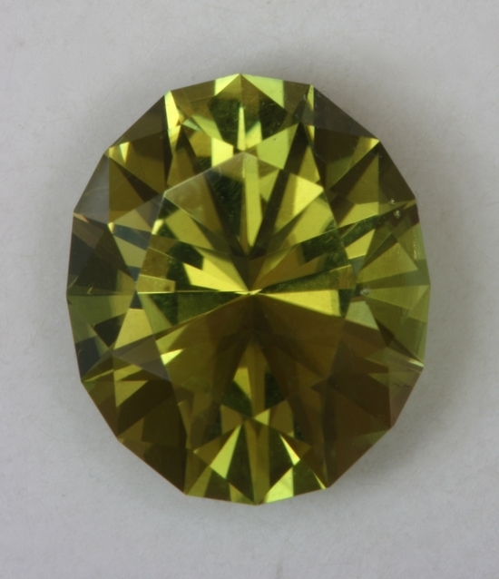 Bright yellow to yellow green oval.