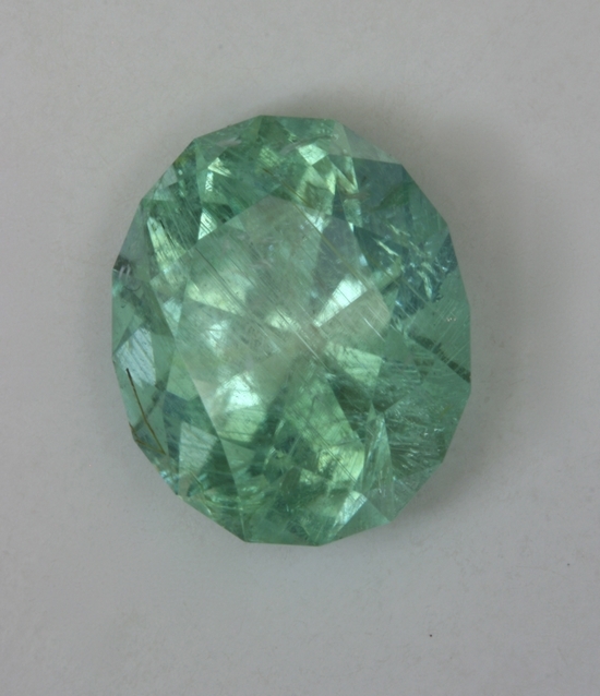 Included bright blue green oval