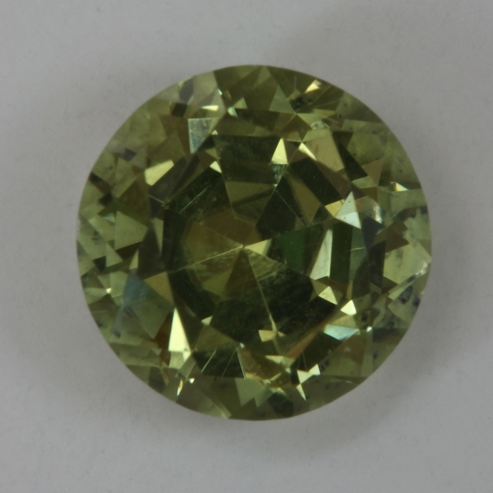 Deeply cut and bearly greenish, this yellow round is beautiful. #117